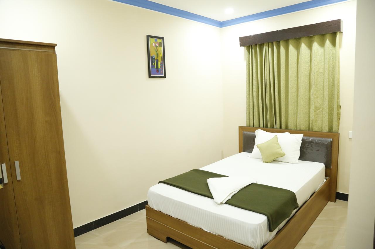 Hotel New Amirtham Inn Palni Extérieur photo